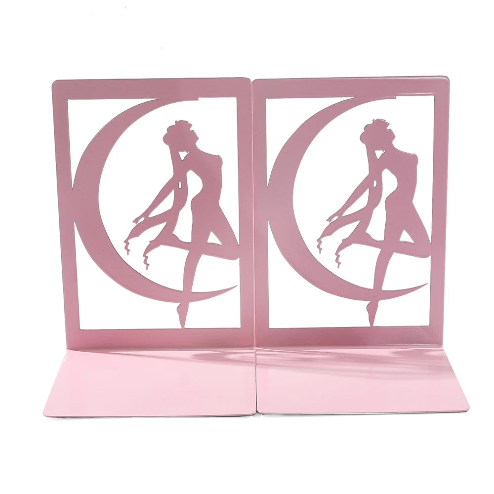 Pink metal bookends with a design of a woman and a crescent moon on a white background