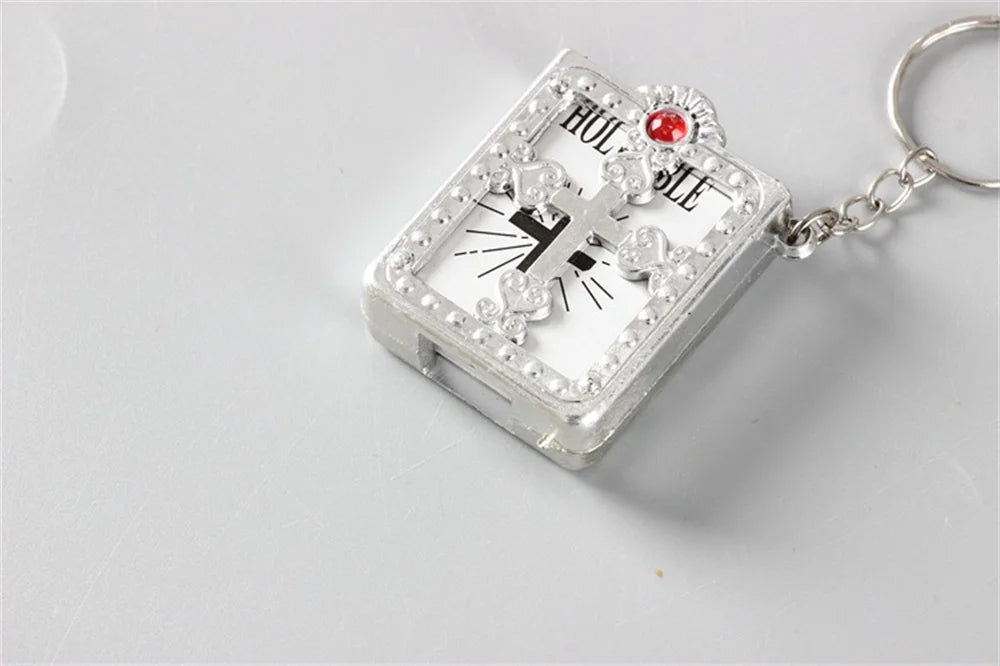 Mini gold-tone Holy Bible keychain pendant with jewel embellishments