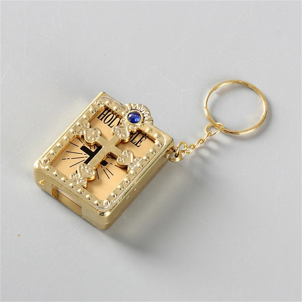 Mini gold-tone Holy Bible keychain pendant with jewel embellishments