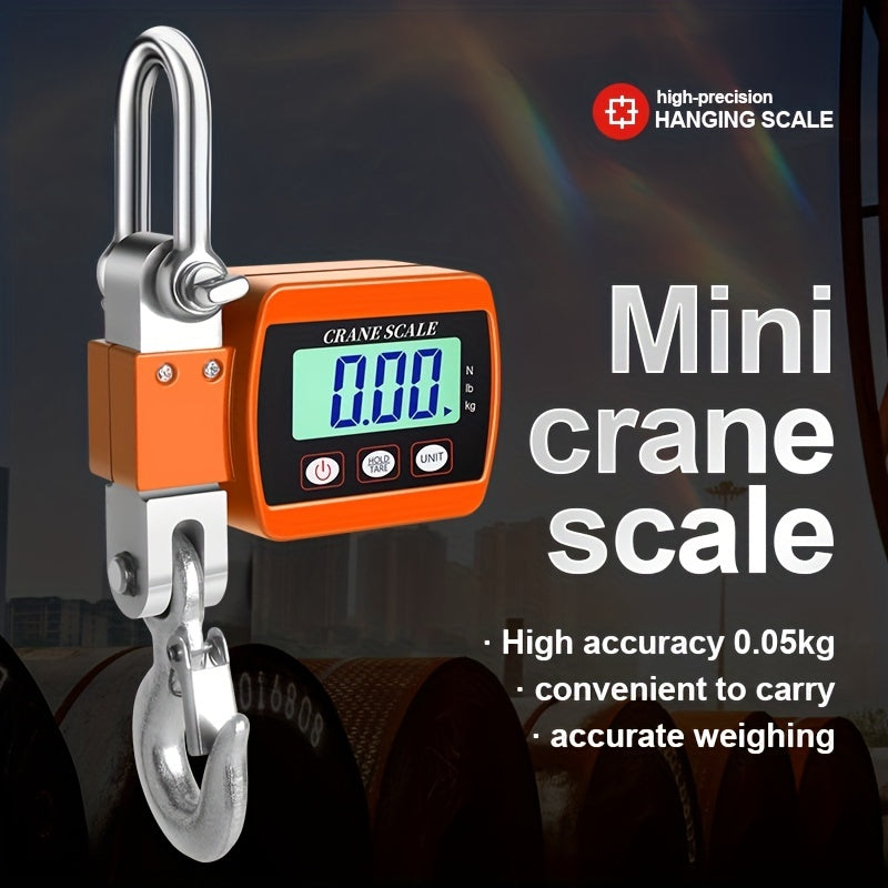 Mini crane scale with digital display on a dark background