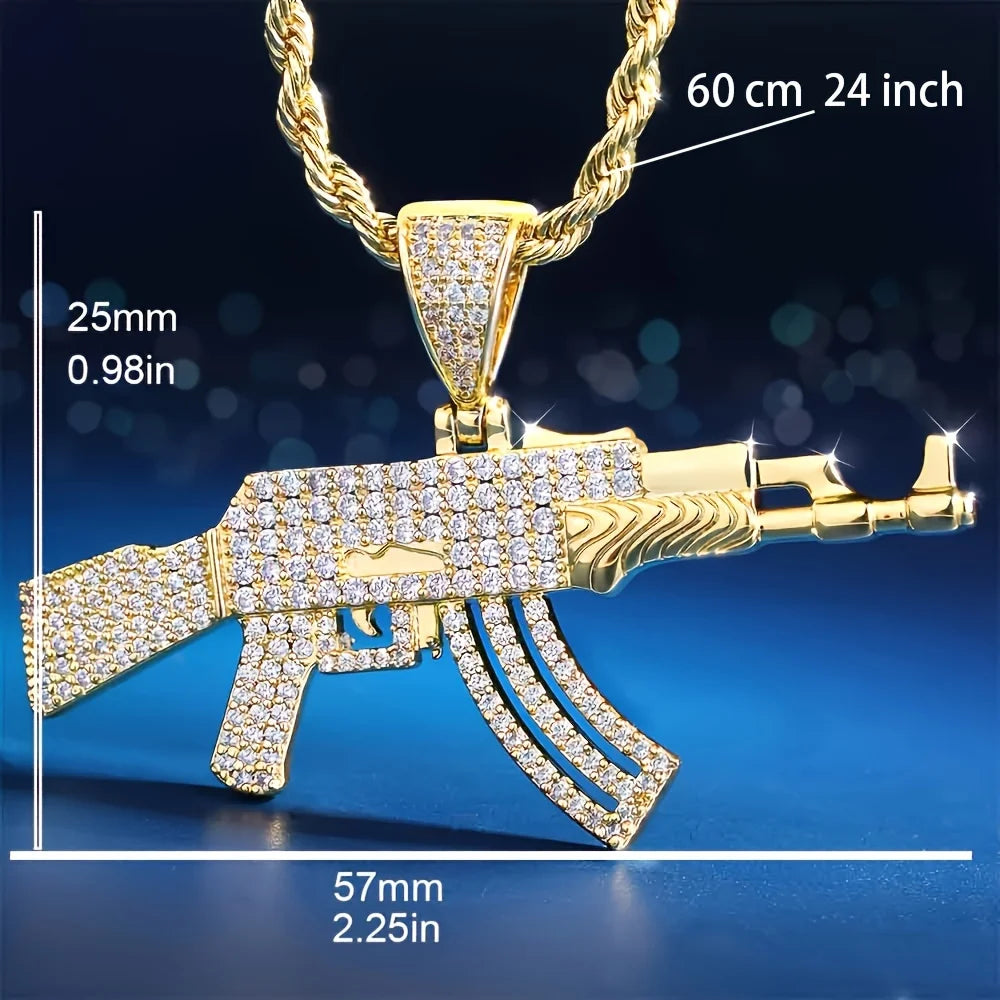 Gold AK47 gun-shaped pendant with diamond accents on a blue background