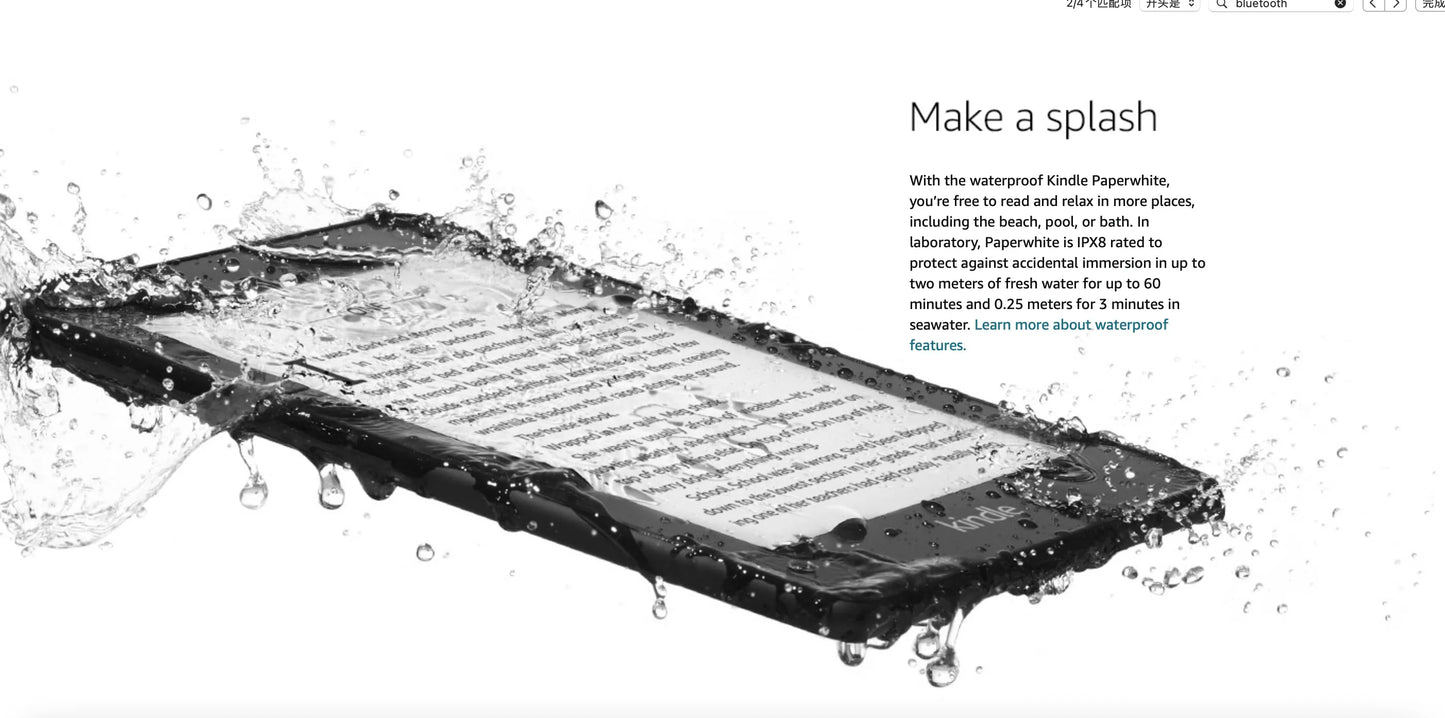 Black waterproof Kindle Paperwhite with water splashes on a white background