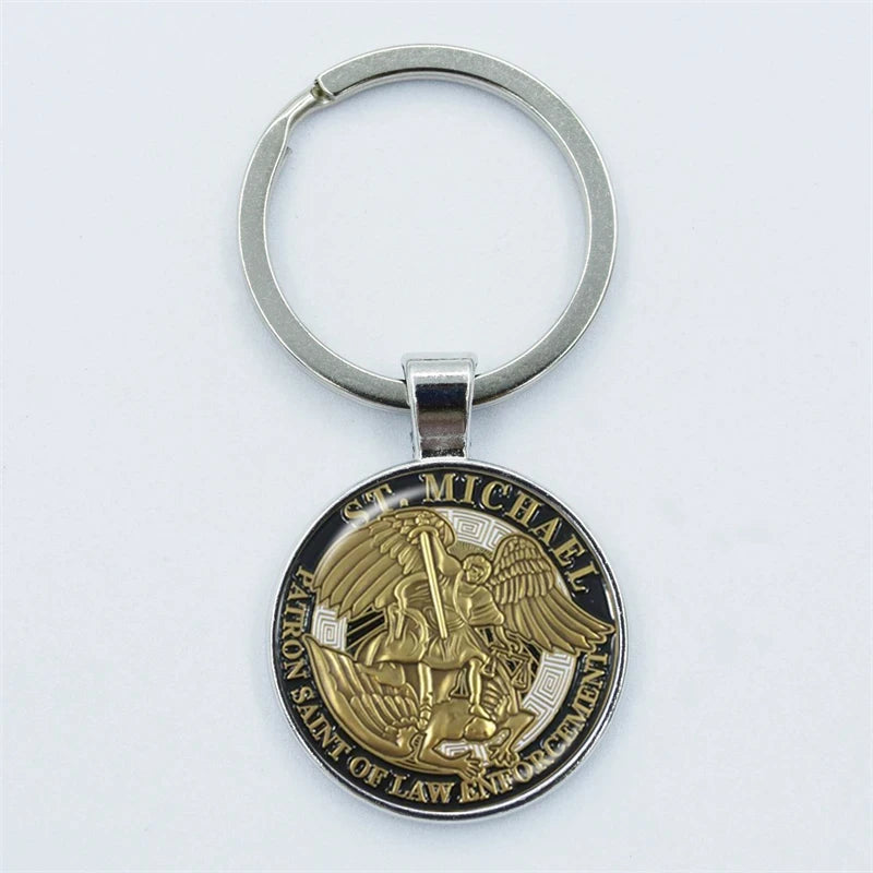 Keychain with gold and silver emblem on a white background