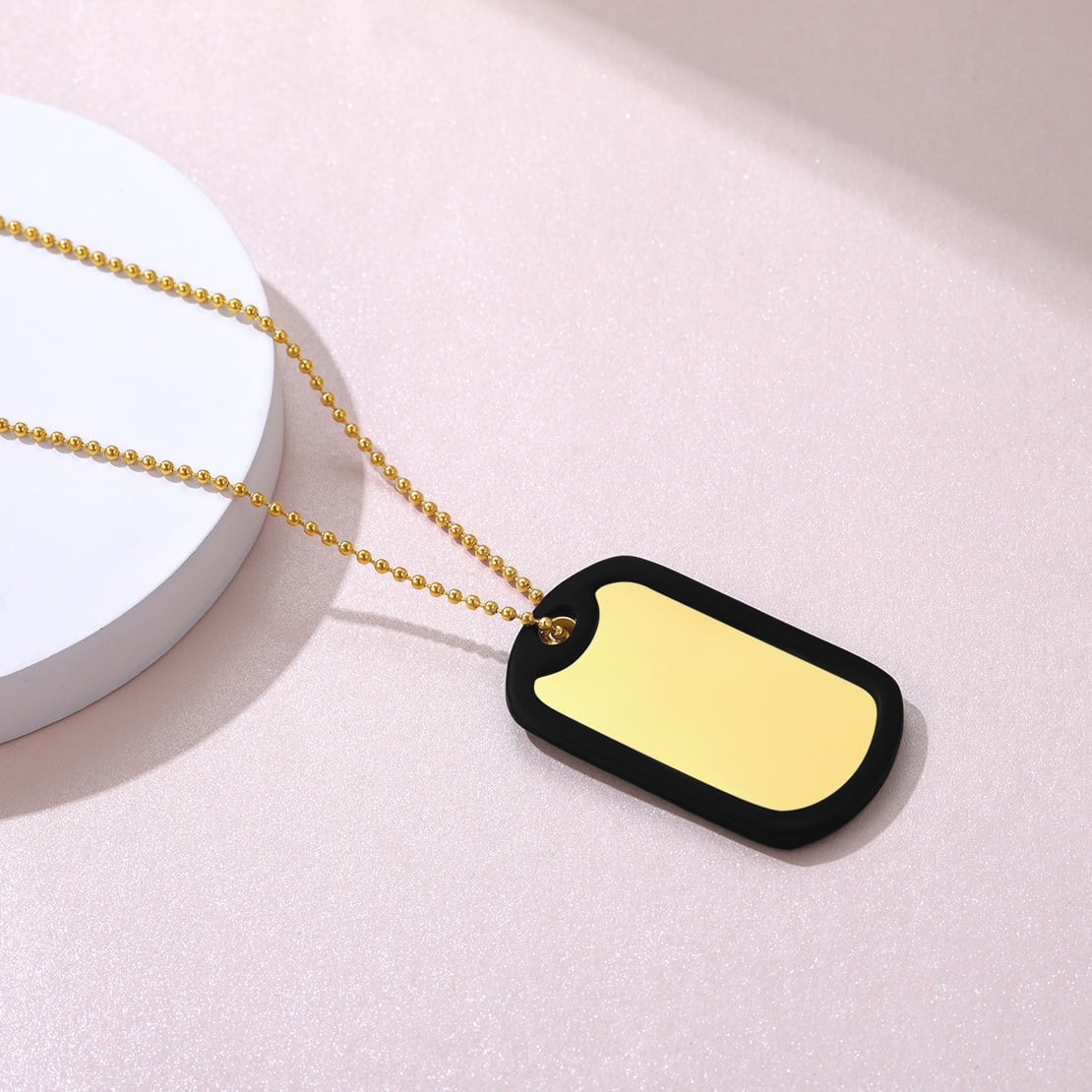 Archangel Michal Dog Tag Pendant Necklace displayed showing the backside laid flat on white background.