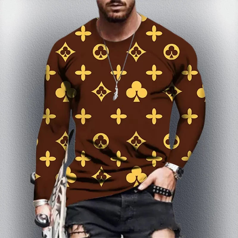 Man wearing a brown long-sleeve shirt with gold patterns against a gray background