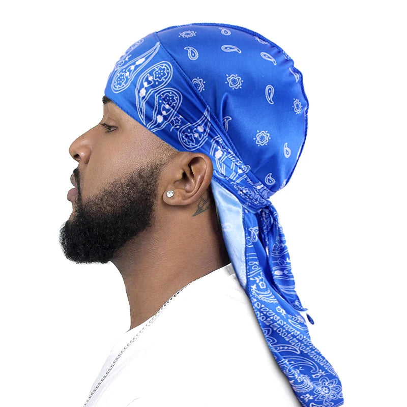Man wearing a blue rag bandana durag with white bandanna pattern on a white background
