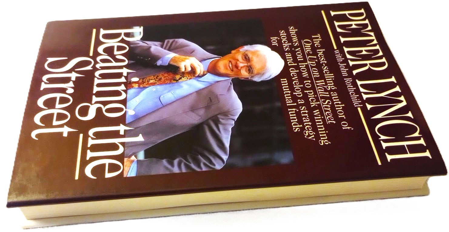 Book titled 'Beating the Street' by Peter Lynch on a white background