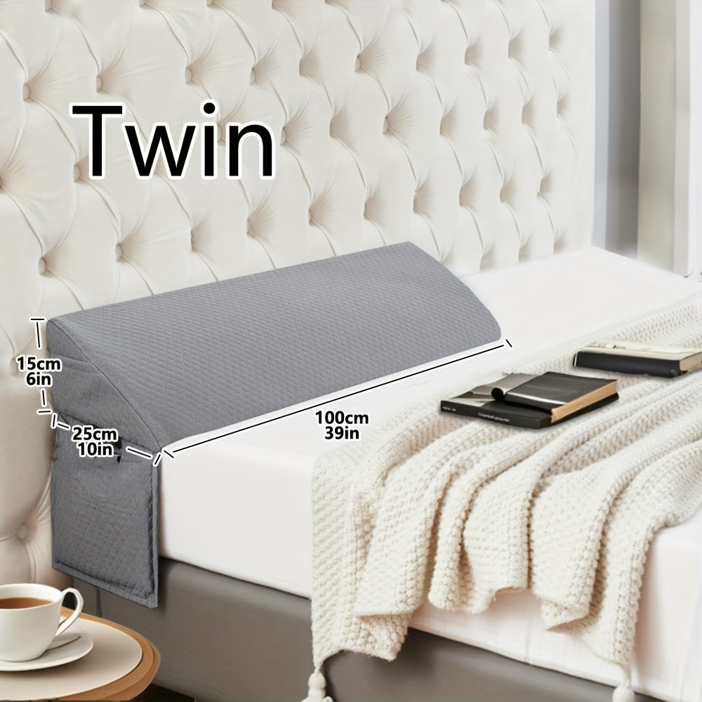 Grey mattress cover on a bed with dimensions labeled, set against a white tufted headboard.