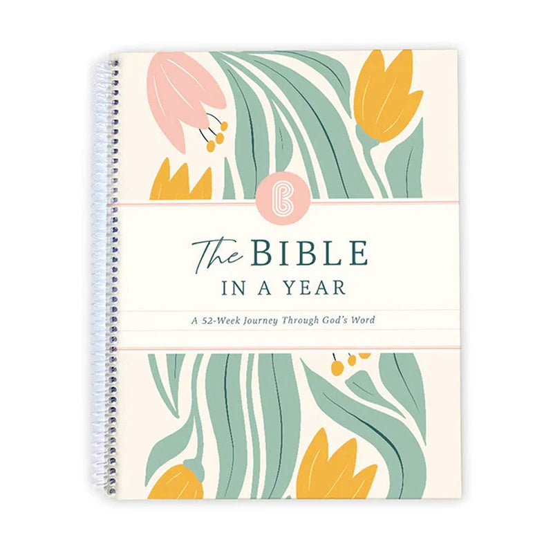 Notebook book front cover titled 'The Bible in a Year: A 52 Week Journey Through God's Word [ISBN: 9798999045805]' with floral design on cover