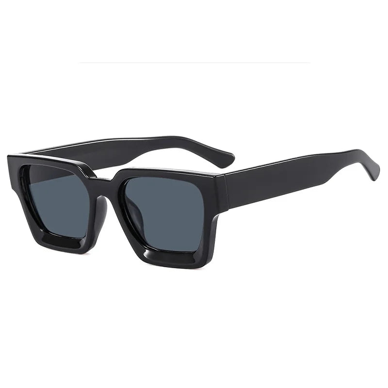 Black sunglasses with dark lenses on a white background