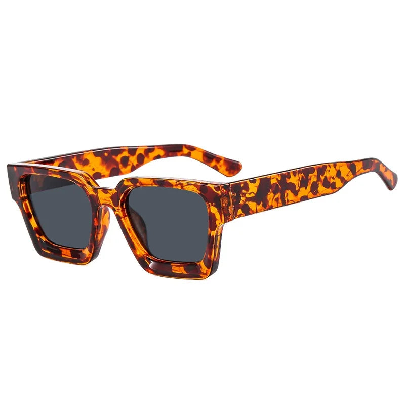 Sunglasses with tortoiseshell frame on a white background