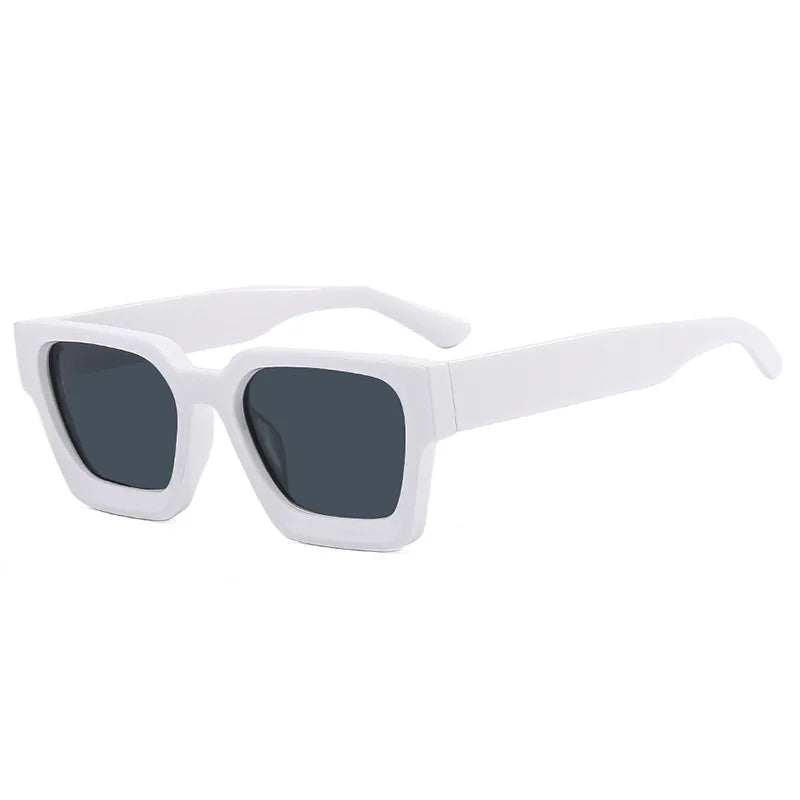 White sunglasses with dark lenses on a white background