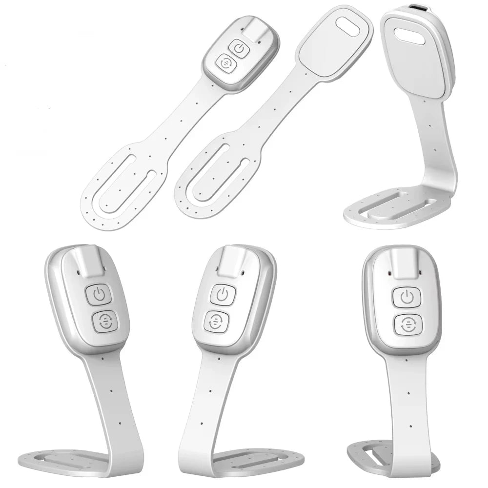 Set of white electronic thin book lights with arm and leg clip attachments on a white background