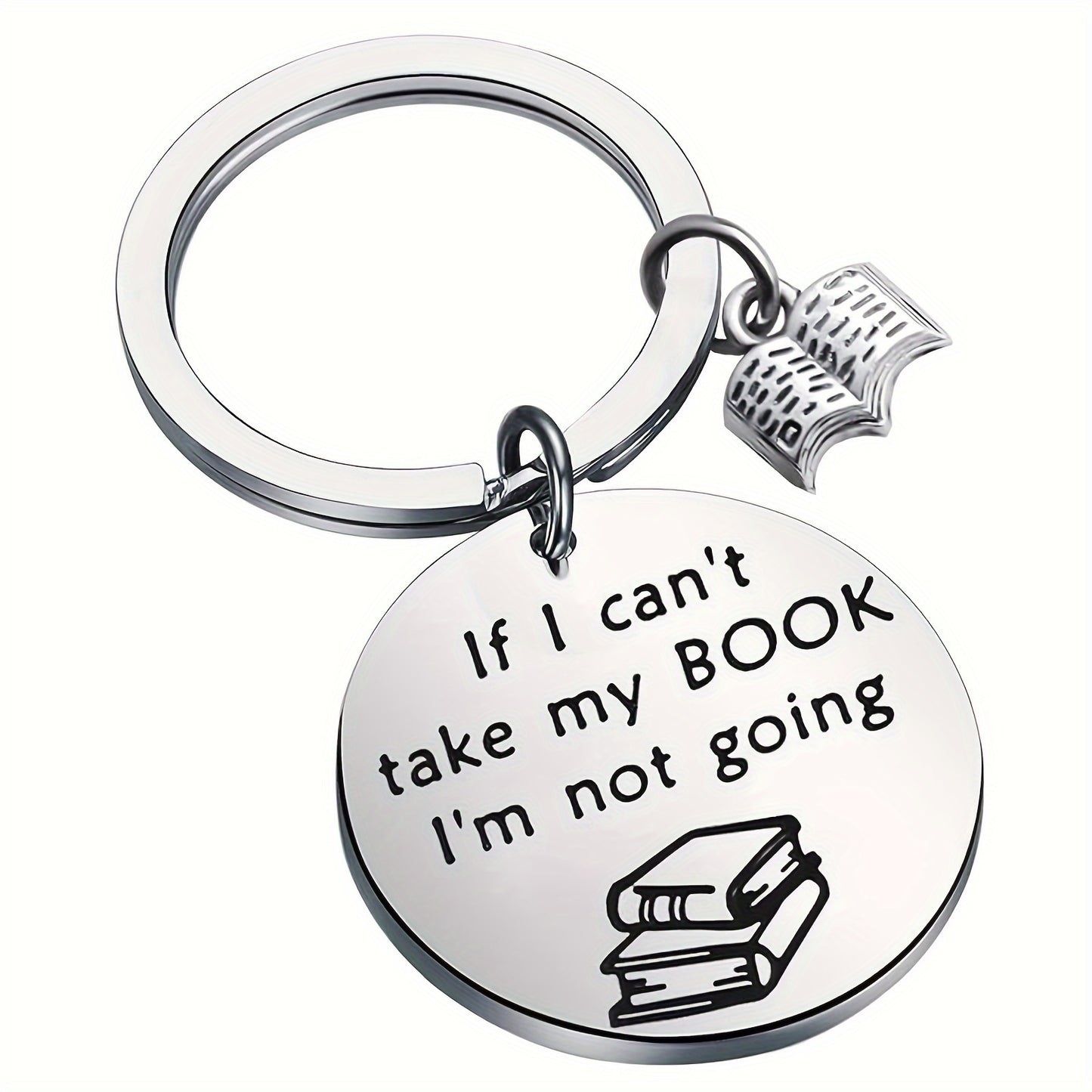 Silver keychain with round tag and book-themed design on a white background