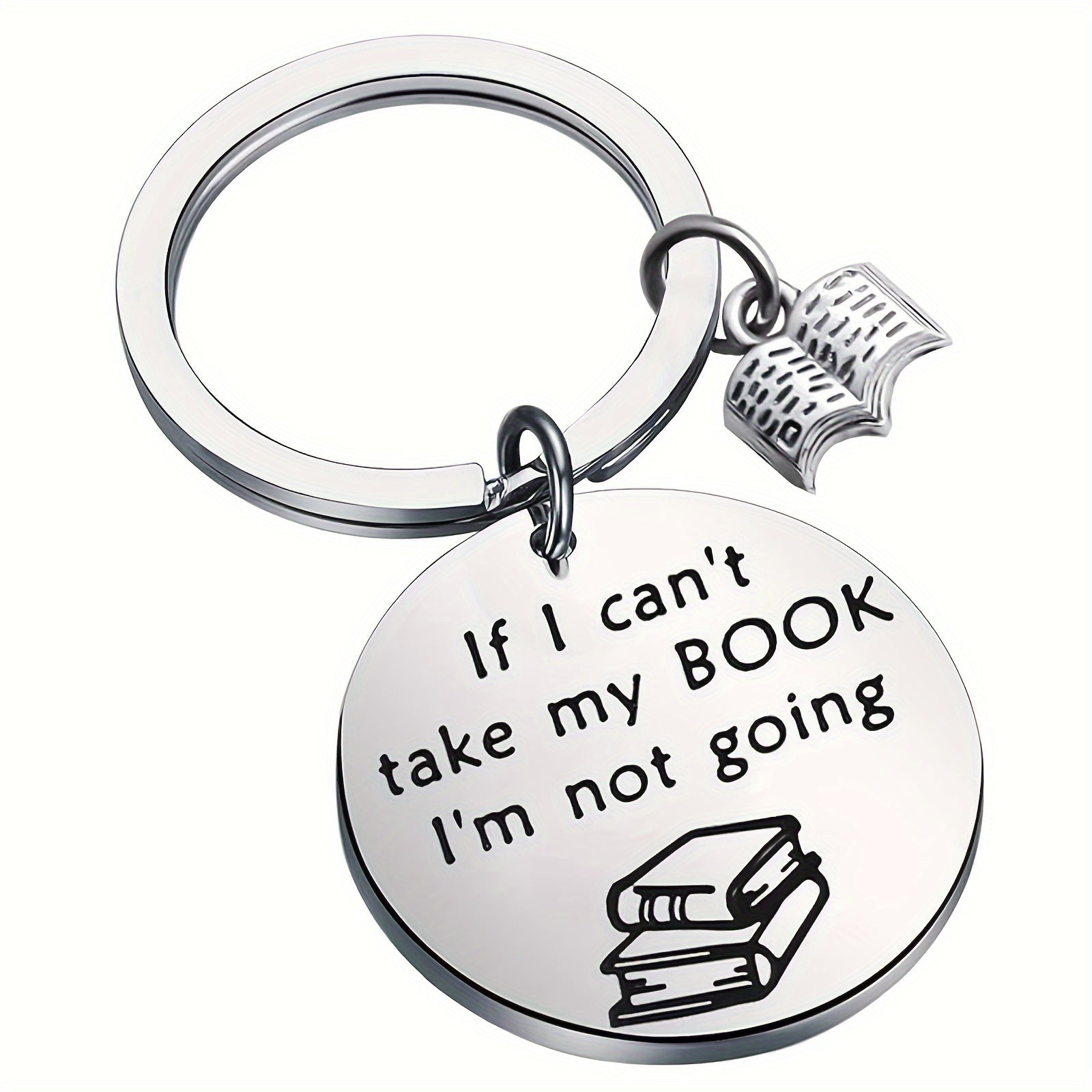 Silver keychain with round tag and book-themed design on a white background