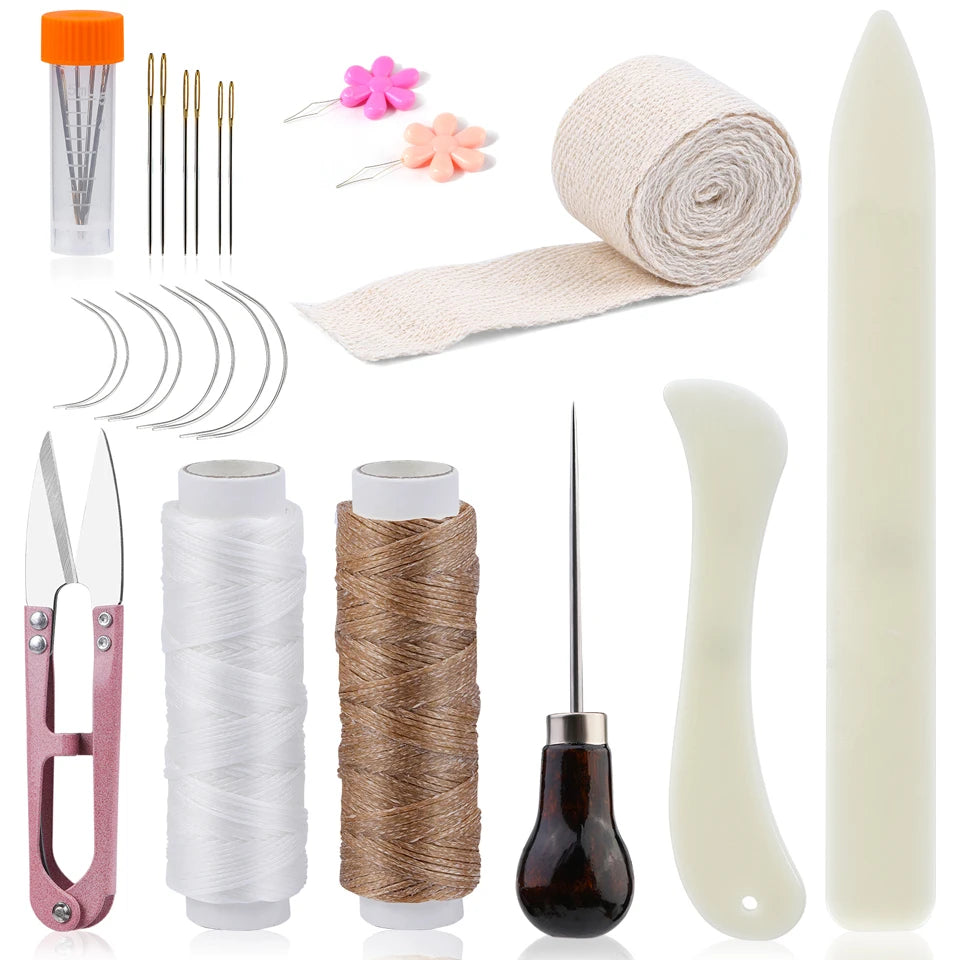 Set of craft supplies including thread, scissors, and tools on a white background
