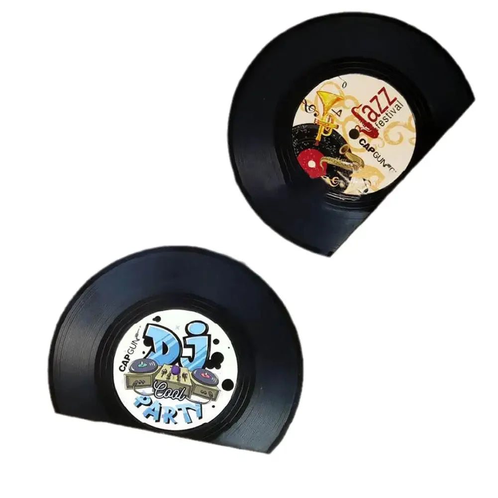 two bookends in set laid out with no background and apart from each other to offer best possible view of vinyl record bookends from Bust-Down.