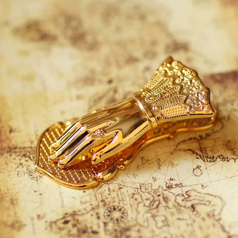 Vintage gilded brass hand-shaped notebook clip for book decoration.