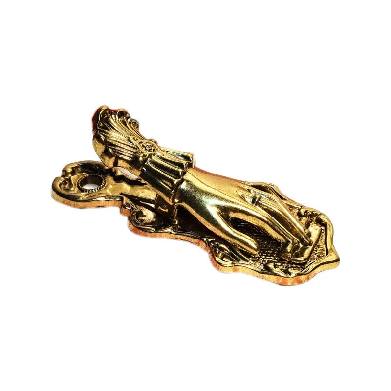 Vintage gilded brass hand-shaped notebook clip for book decoration.