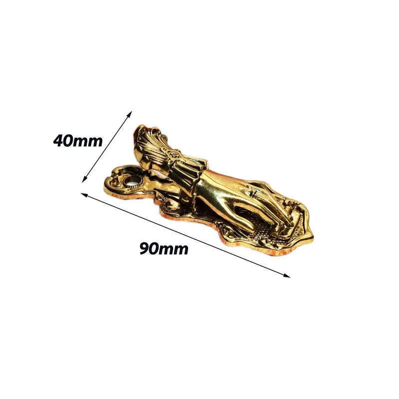 Vintage gilded brass hand-shaped notebook clip for book decoration.