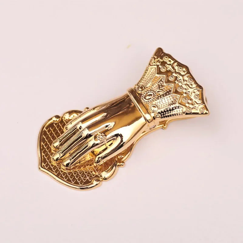 Vintage gilded brass hand-shaped notebook clip for book decoration.