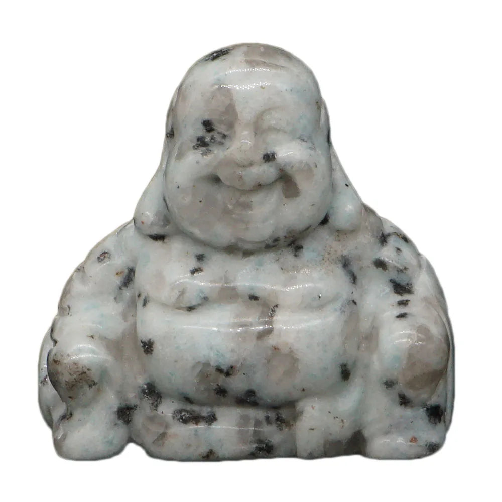 White lotus jasper stone Buddha figurine with black specks on a white background