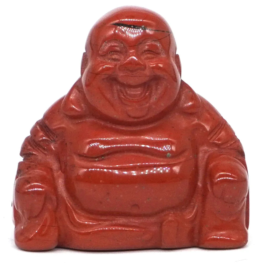 Red laughing Buddha statue on a white background