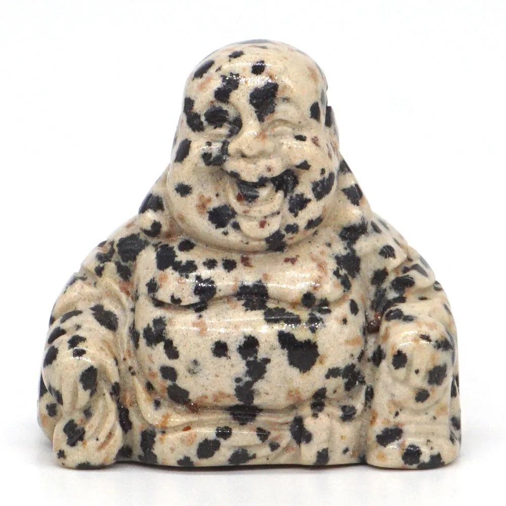 Spotted Buddha statue on a white background