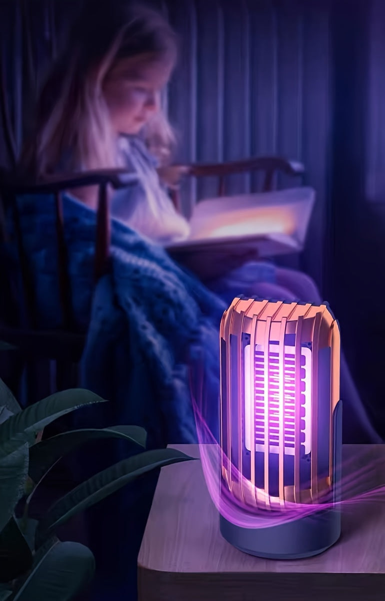 Person reading a book in a dimly lit room with a glowing lamp on a table.
