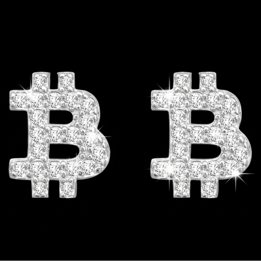 A pair of Bitcoin-shaped stud earrings covered in sparkling clear stones, set against a solid black background.
