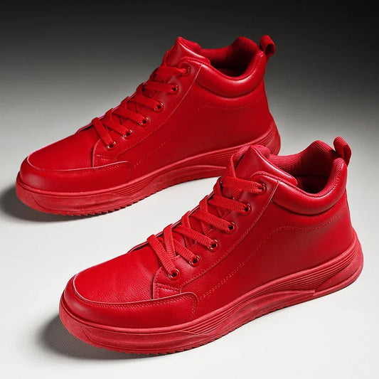 Pair of red high-top sneakers on a gradient background