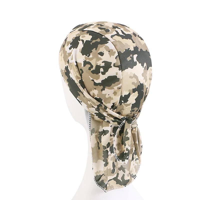 Camouflage-patterned head wrap on a mannequin head against a white background