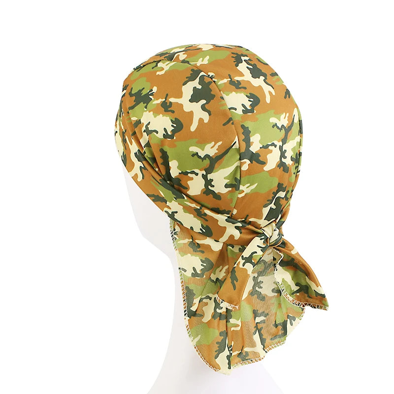 Camouflage-patterned head wrap on a white mannequin head against a white background