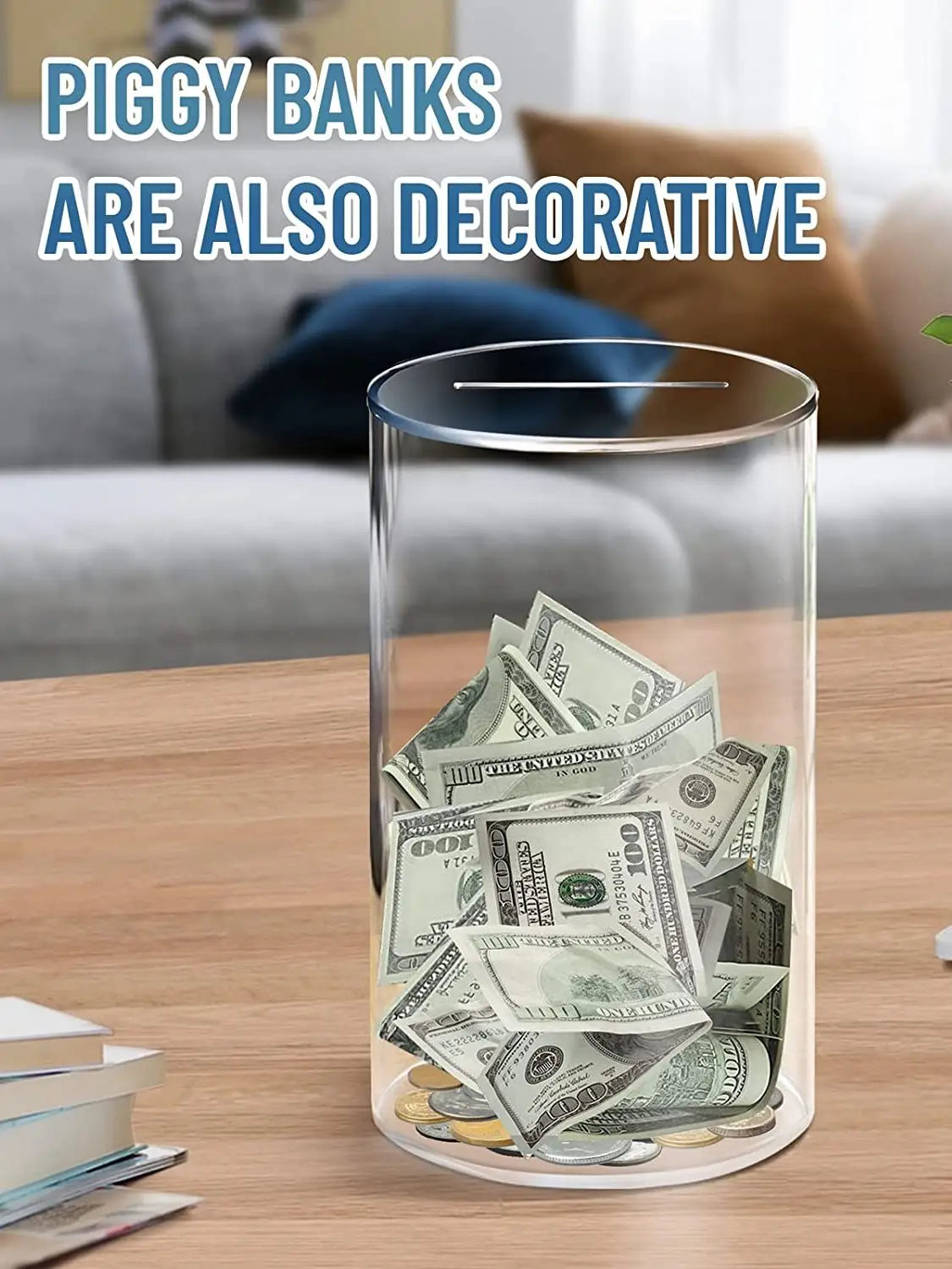 Decorative acrylic piggy bank filled with money on a wooden surface.