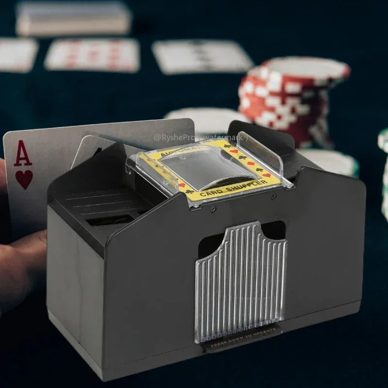 Card shuffling machine with playing cards and poker chips in the background