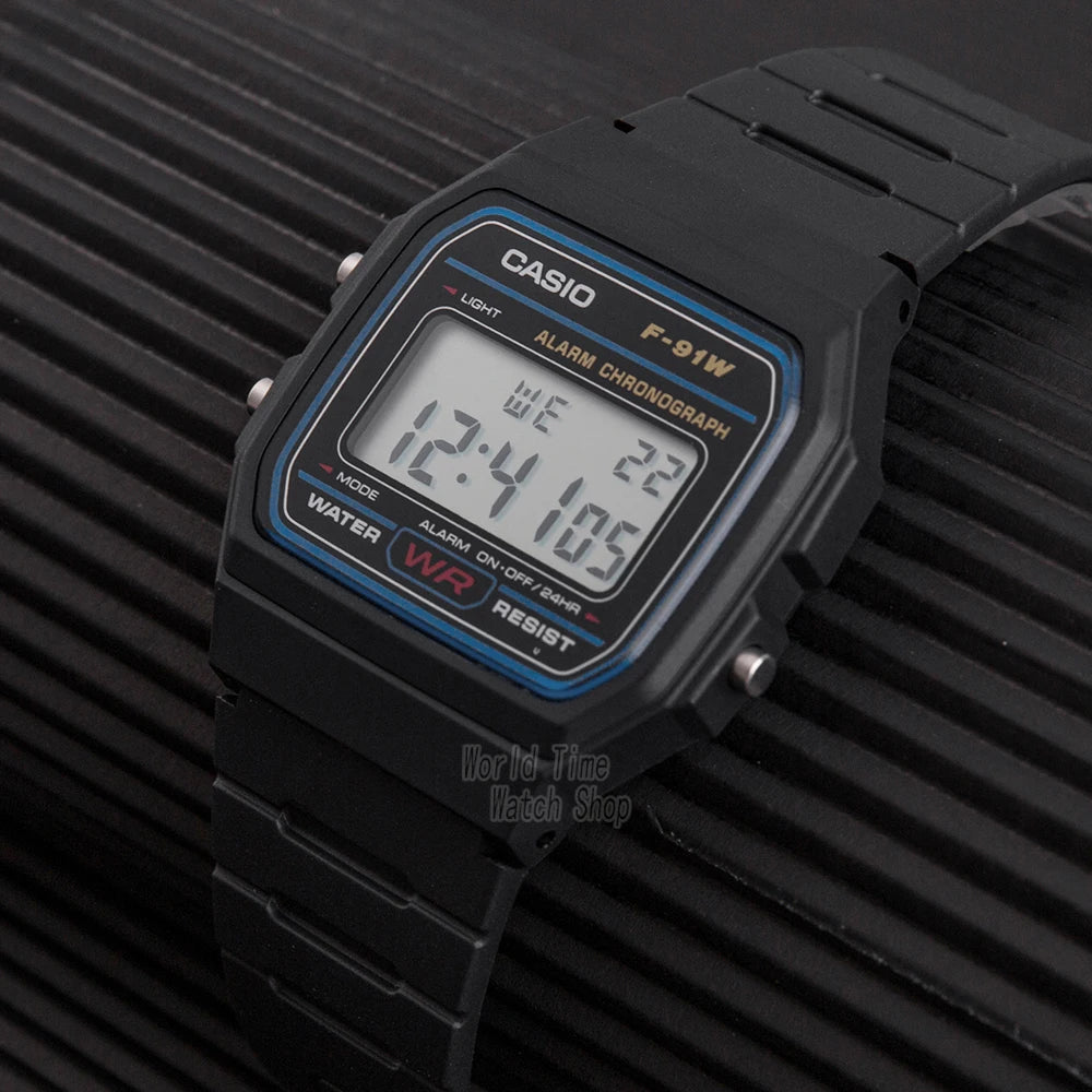 Black Casio digital watch on a dark textured background