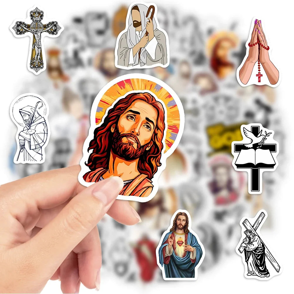 Collection of religious-themed stickers held by a hand with a blurred background