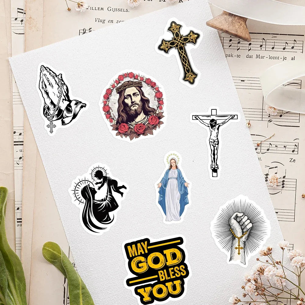 Sheet of religious-themed vinyl waterproof stickers on a sheet of music paper.
