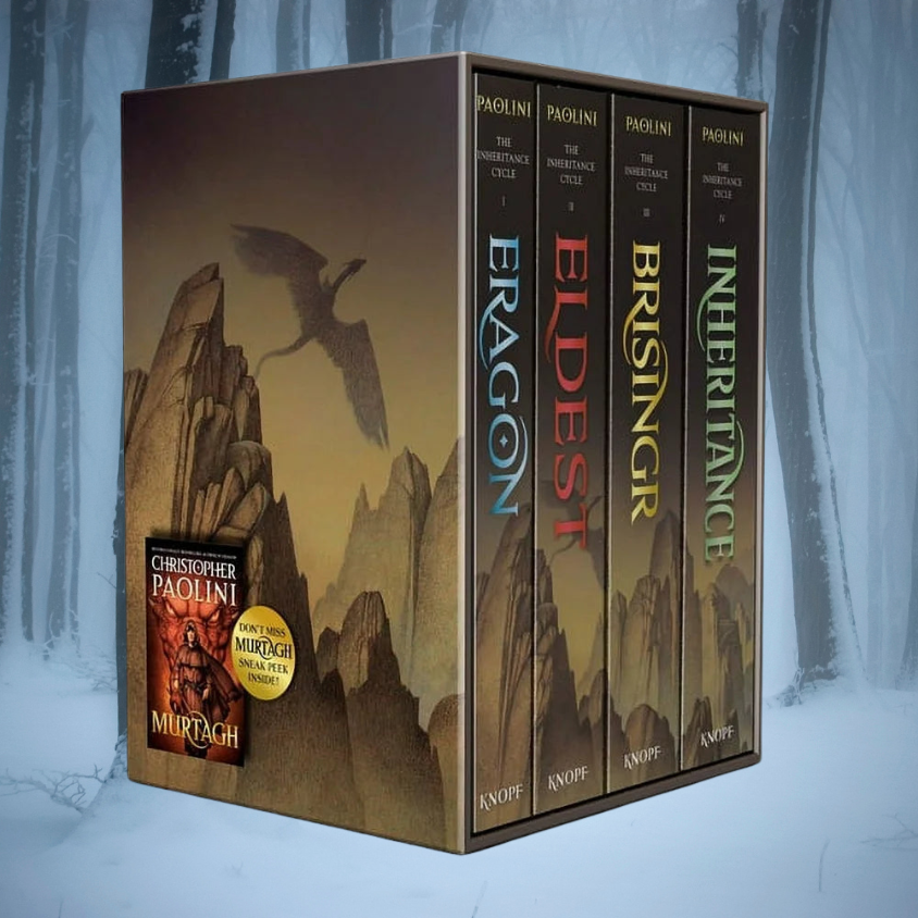 Book angled view of book series "Christopher Paolini Inheritance Cycle Box Set Eragon-Eldest-Brisingr-Inheritance" featuring a snowy forest background.