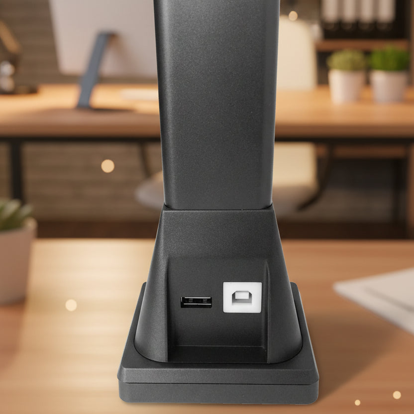 Black printer scanner with USB ports on a white background