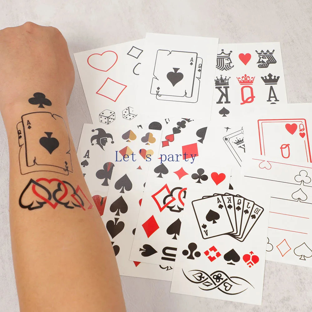 Playing card temporary tattoos with a person's arm showing tattoos matching the designs.