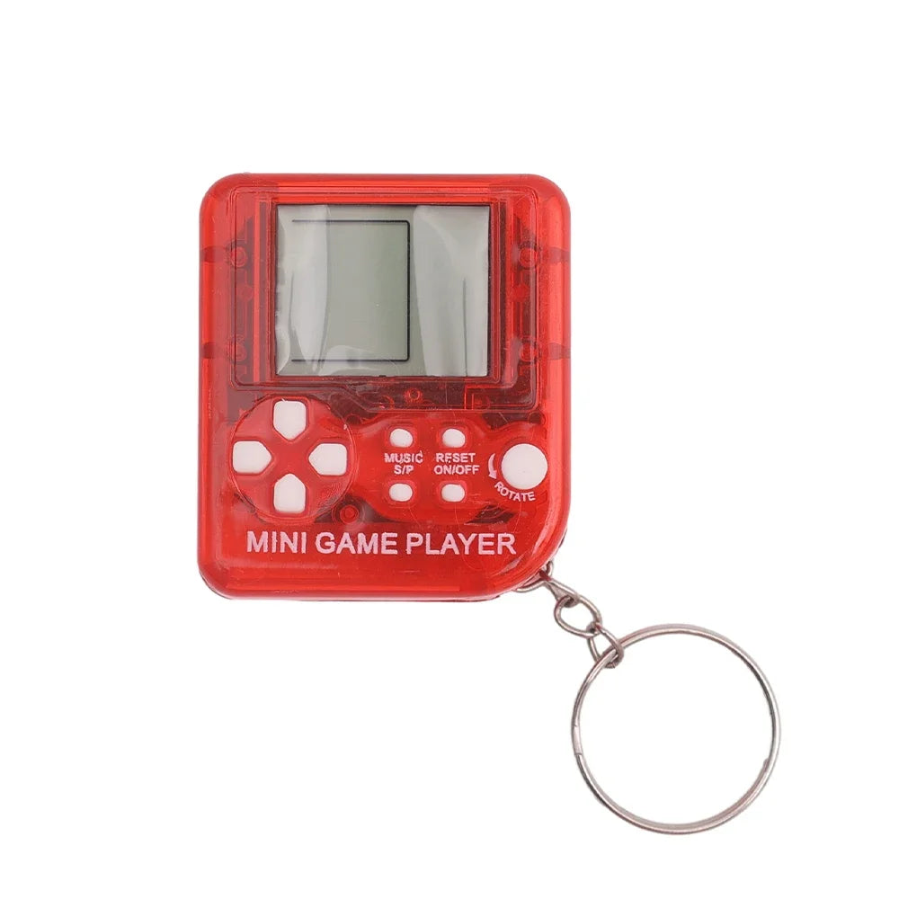 Red mini game player with a keychain on a white background