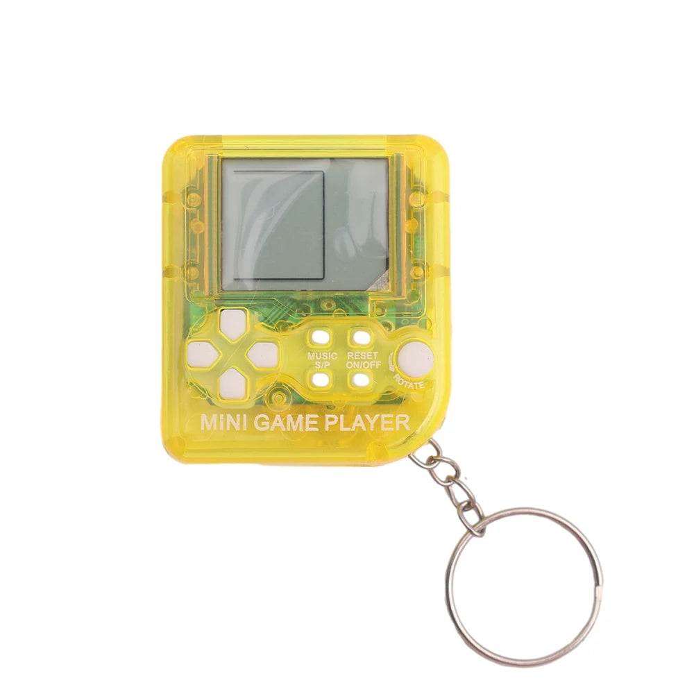Yellow mini game player keychain on a white background