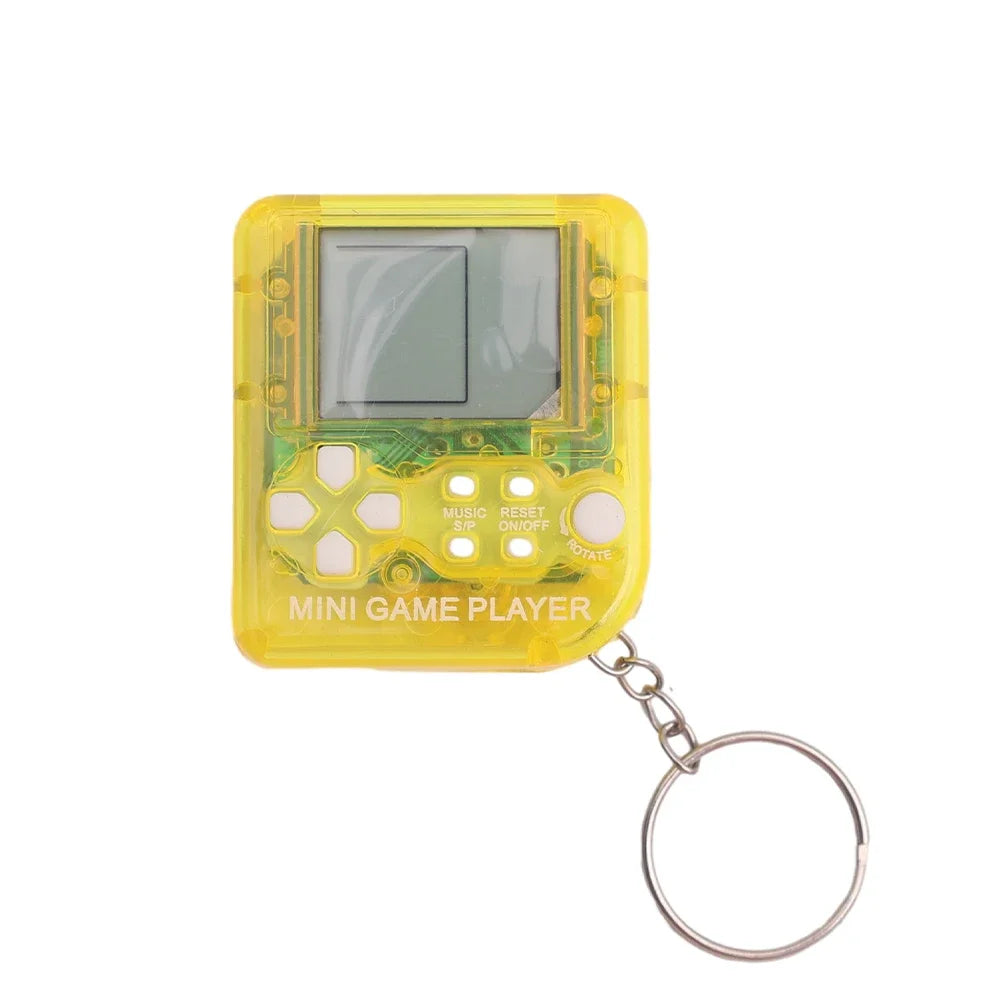 Yellow mini game player keychain on a white background
