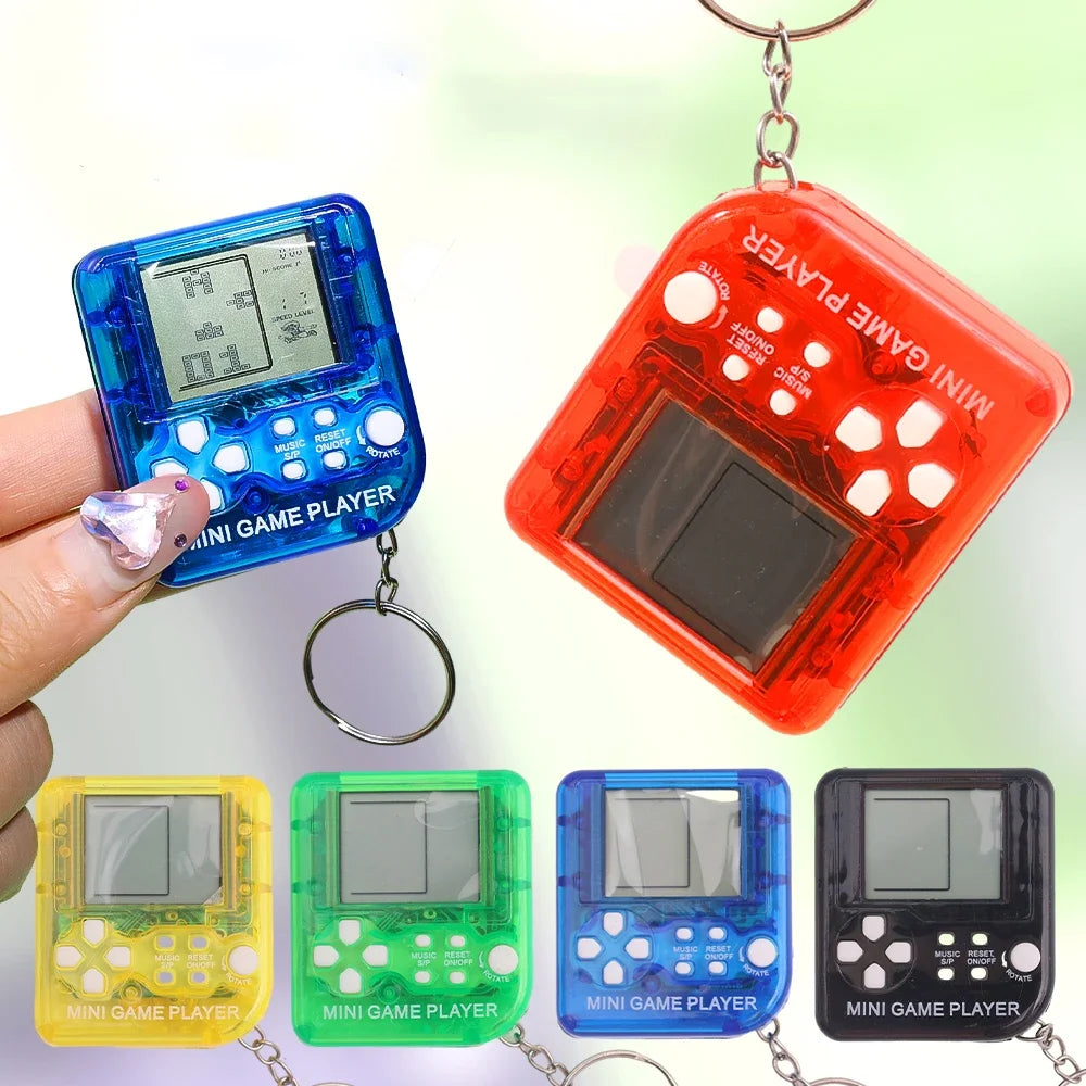 Collection of colorful mini game players with keychains on a white background