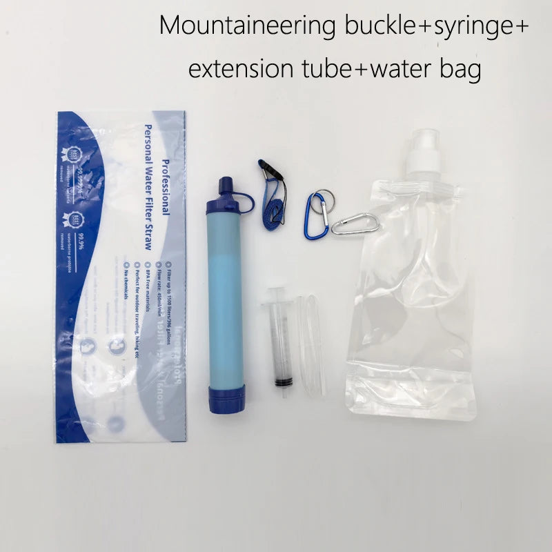 Mountaineering buckle, syringe, extension tube, water bag and all components of clean water drinking straw on a white background