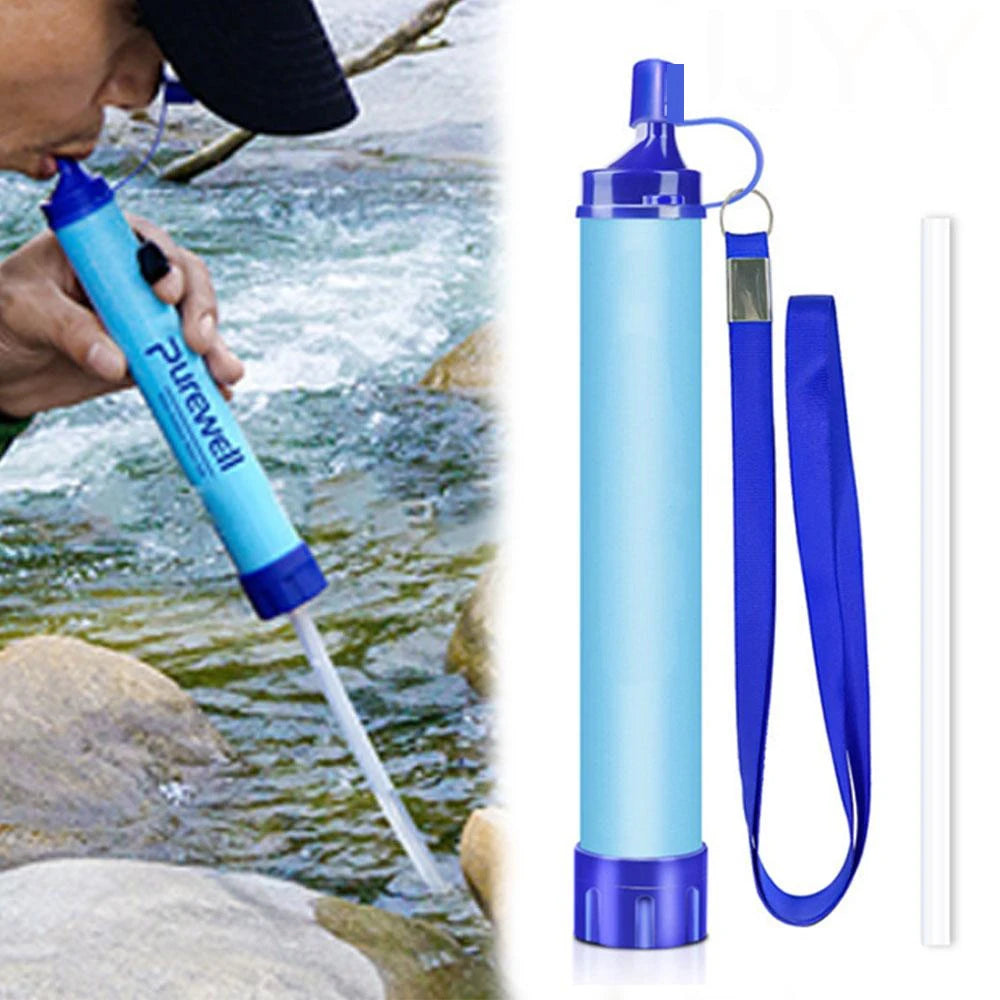 Blue water filter straw with a person using it by a stream to drink water rom