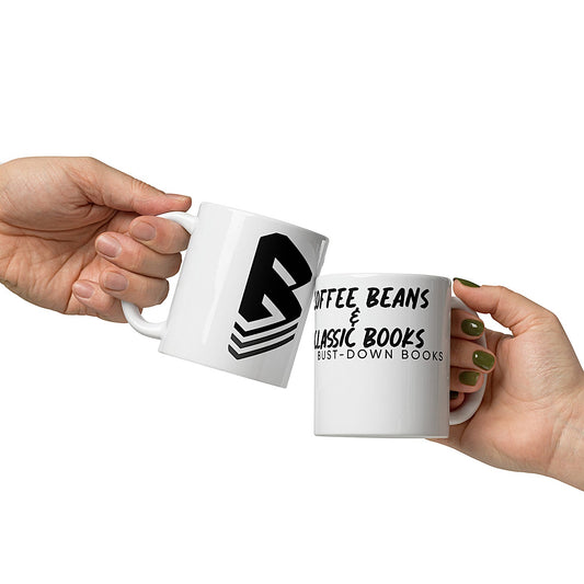Two hands holding a white ceramic coffee mug with black text and graphics, including a question mark and the BDB logo, with a background of one hand holding a second mug.