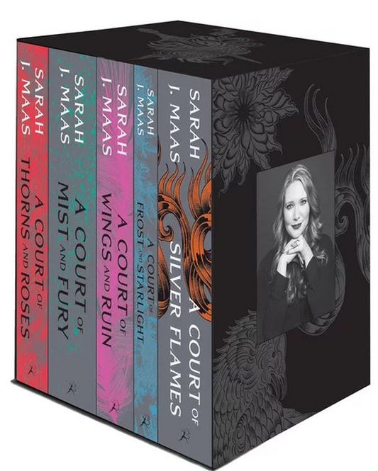 A boxed book set for Sarah J. Mas's 'A Court of Silver Flames' series, featuring five distinct colored spines in red, pink, purple, blue, and gray, with a black cover decorated with a silver dragon and a portrait of the author.