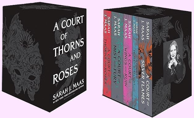 A five-book box set of 'A Court of Thorns and Roses' by Sarah J. Maas, featuring hardcover editions with black and floral design on the covers.